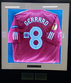 A red Liverpool shirt with the number eight and Gerrard’s name on the back